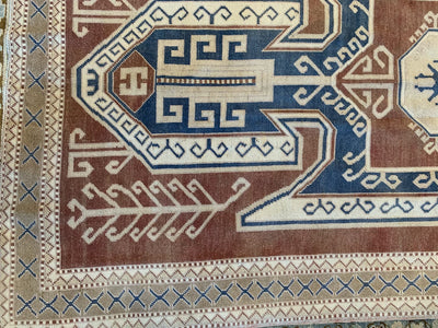 Corner and border of a blue & green extra large Kars Turkish Rug.