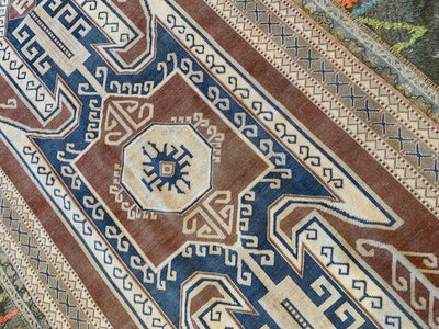 Beautiful central medallion on a blue & green extra large Kars Turkish Rug.