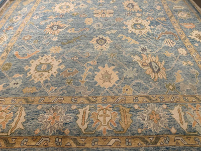 A blue & green Kars Turkish area rug.