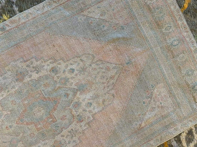 Top down shot of medium sized blue/green Sivas Turkish Rug.