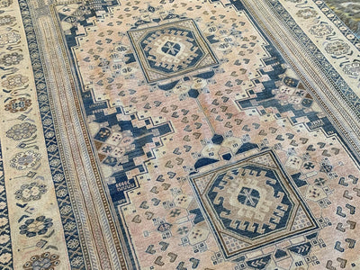 Central medallions on a blue & green extra large Sivas Turkish Rug.