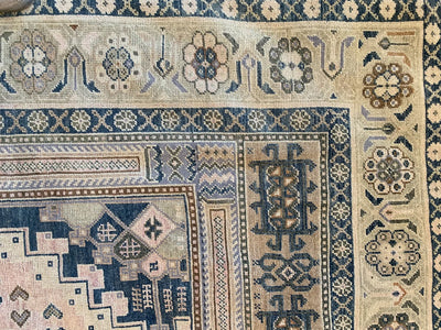 Corner of a blue & green extra large Sivas Turkish Rug.