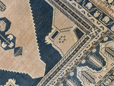 Close up of corner designs on a blue & green extra large Sivas Turkish Rug.
