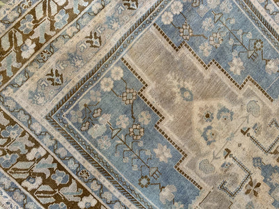 Border work on a blue & green extra large Sivas Turkish Rug.