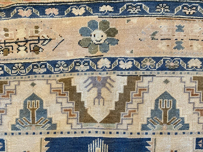 Smiling flower on a blue & green large Sivas Turkish Rug.