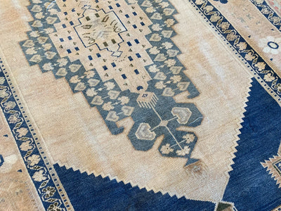 Central medallion on a blue & green large Sivas Turkish Rug.