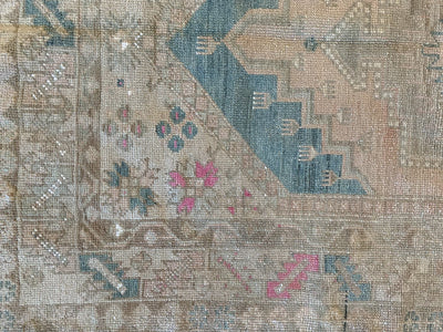 Corner work and close up of knotting on a blue & green medium Bor Turkish Rug.