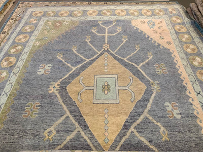 A blue & green Oushak Turkish area rug.