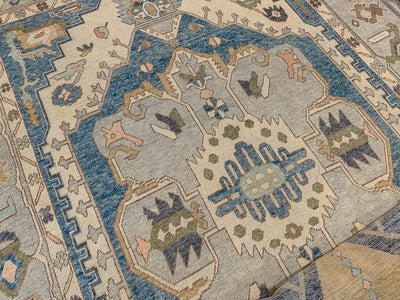 A blue & green Oushak Turkish area rug.