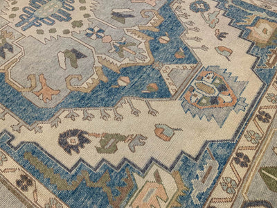 A blue & green Oushak Turkish area rug.