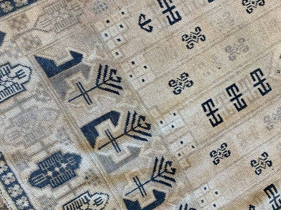 Close up of knott work on a blue & green small Sivas Turkish Rug.