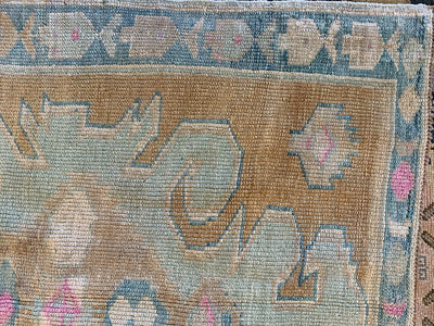 Corner of blue & green small Sivas Turkish Rug.