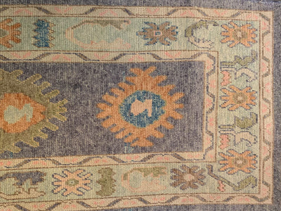 End of a blue & green Turkish runner rug.