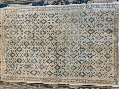 Full length shot of a brown & grey small Sivas Turkish Rug.