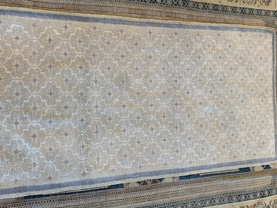 Full length shot of a brown & grey small Sivas Turkish Rug.