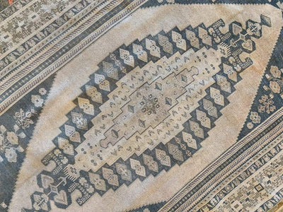 Central medallion on a extra large brown & grey Sivas Turkish rug.