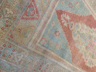 Corner perspective of an extra large red & orange Sivas Turkish Rug.