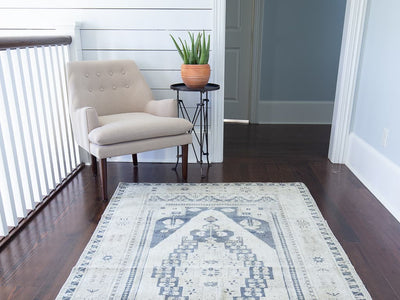 Chair and medium blue and green Sivas Turkish Rug.