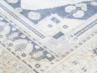 Corner close up of medium blue and green Sivas Turkish Rug.