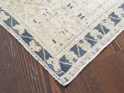 Corner of medium blue and green Sivas Turkish Rug.