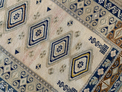 Central medallions on medium blue & green Sivas Turkish Rug.