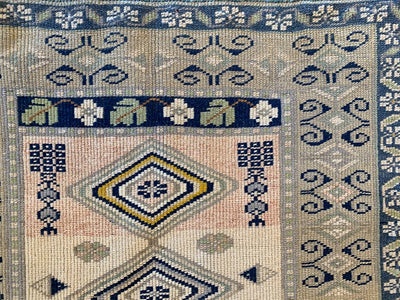 Corner of medium blue & green Sivas Turkish Rug.