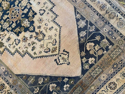 Central medallion of a extra larage blue and green Sivas Turkish rug.