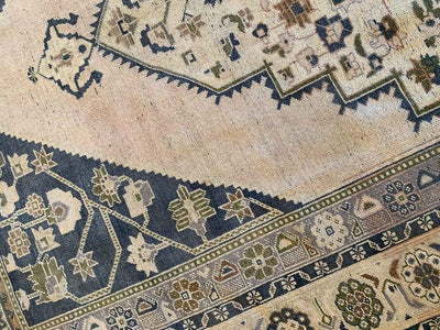 Corner arch work on a extra large blue and green Sivas Turkish rug.