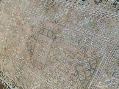 Full view of a medium brown and grey Sivas Turkish rug.