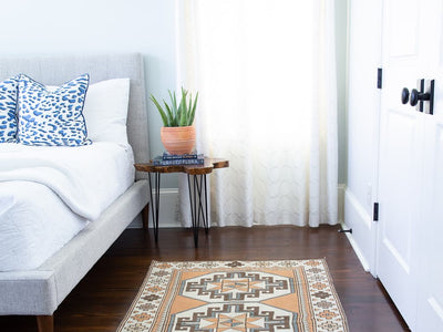 Bedroom with red & orange small Varosh Turkish rug.