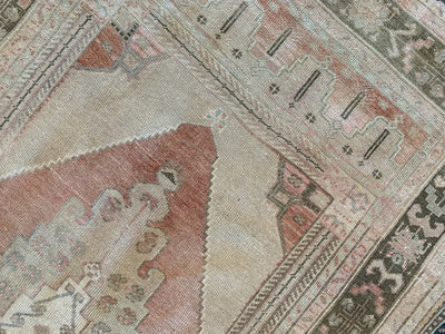 End of a red & orange medium Sivas Turkish Rug.