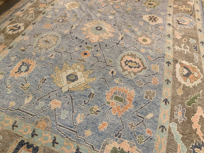 An blue & green Oushak Turkish area rug.