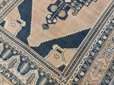 Close up of corner work on a blue & green extra large Sivas Turkish Rug.
