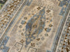 Central medallion on a blue & green extra large Sivas Turkish Rug.