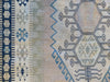 Close up of border and central medallion on a blue & green Large Sivas Turkish Rug.