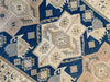 Close up of central medallion and knott work on a blue & green large sivas Turkish Rug.