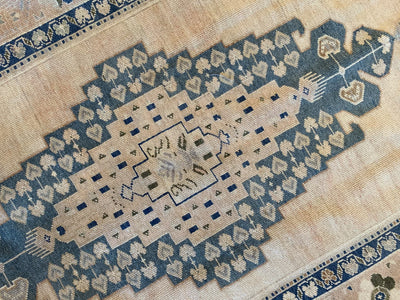 Close up of central medallion on a blue & green large Sivas Turkish Rug.