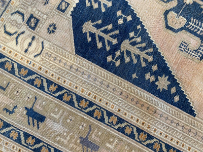 Close up of border and corner work on a blue & green Sivas Turkish Rug runner.