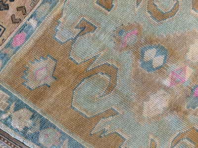 End of a blue & green small Sivas Turkish Rug.