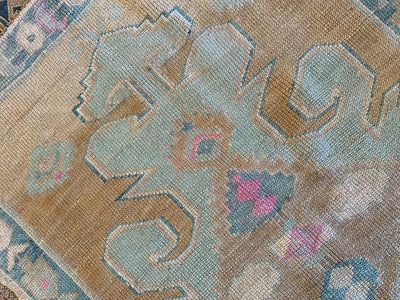 End of large medallion on a blue & green small Sivas Turkish Rug.