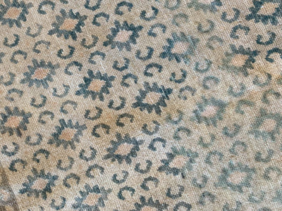 Close up of pattern on a brown & grey small Sivas Turkish Rug.