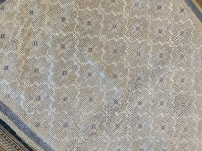 Close up of knotting on a brown & grey small Sivas Turkish Rug.