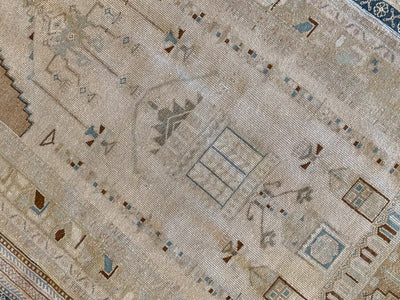 Traditional motifs on a brown & grey small Sivas Turkish Rug.