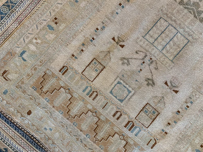 Close up of turkish motifs on a brown & grey small Sivas Turkish Rug.