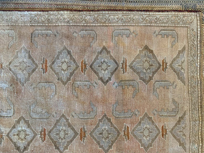 Corner patterns that are repeated on a brown & grey medium Sivas Turkish Rug.
