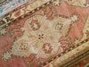 Had knotted small red & orange Cal Turkish rug.